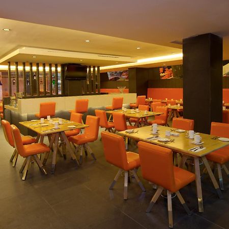 Swiss-Belinn Медан Ресторан фото