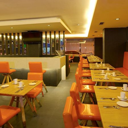 Swiss-Belinn Медан Ресторан фото